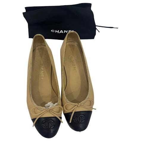 chanel beige ballet flats.